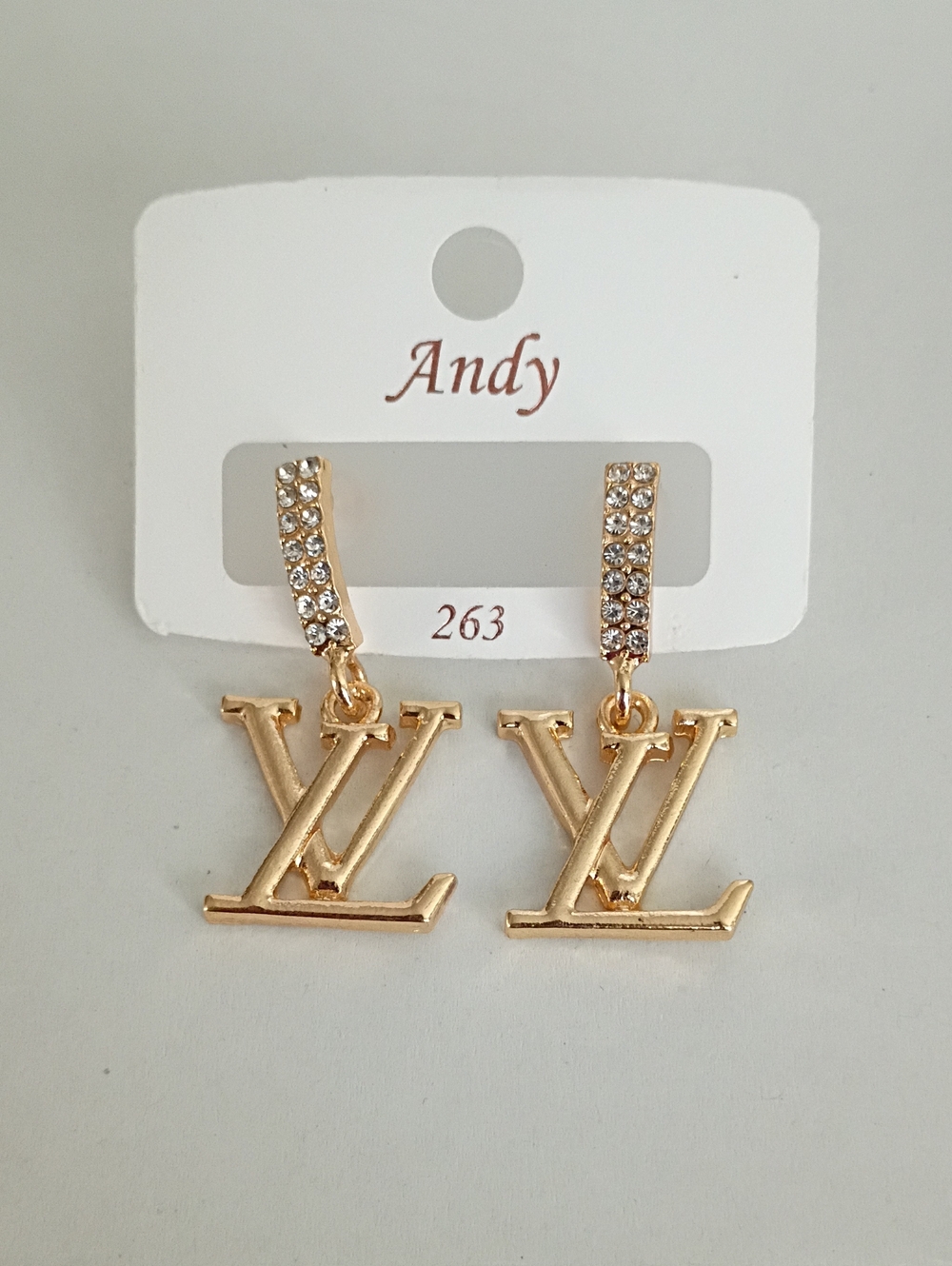 New Gold Tone Logo Drop Earrings with Crystal Accents